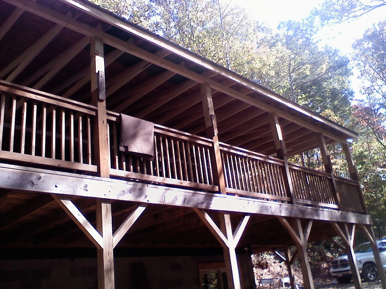 Timber framing under a new elevated porch and deck — Roof Leak Repair in Waseca by Roofing Brothers